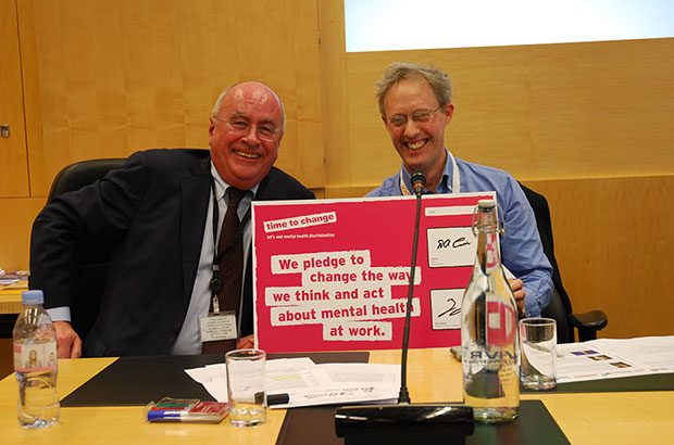 CMA Chairman, David Currie and CMA Senior Director, Adam Land signing the time to change pledge