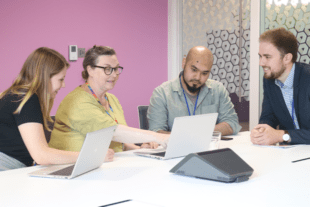 people working together in the CMA office