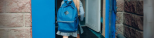 Girl in school uniform walking